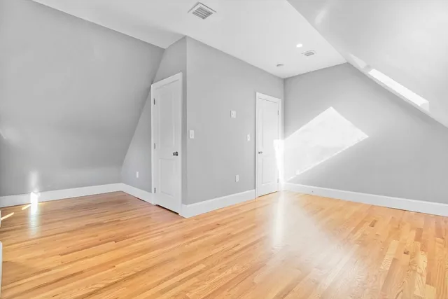 a bathroom with a shower and toilet