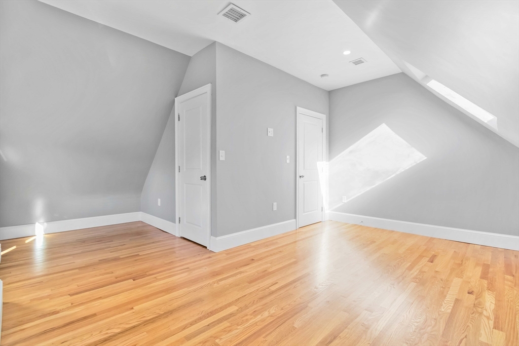 51 Mansfield Street, Unit 49 Everett, MA 02149 - Photo 23 of 31 wooden floor in an empty room