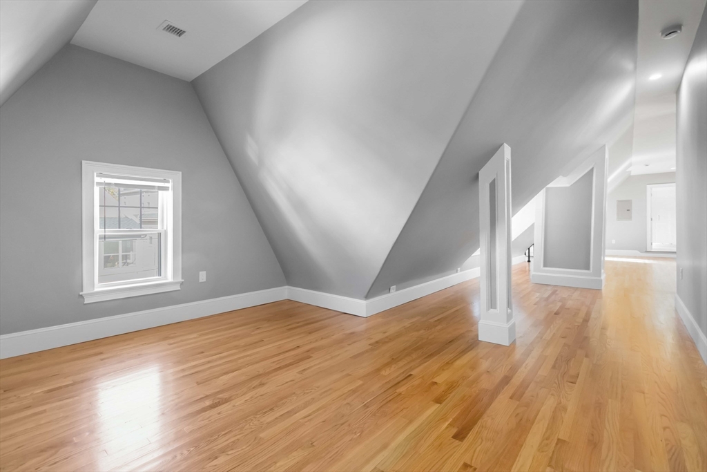 51 Mansfield Street, Unit 49 Everett, MA 02149 - Photo 24 of 31 a view of empty room with wooden floor and fan