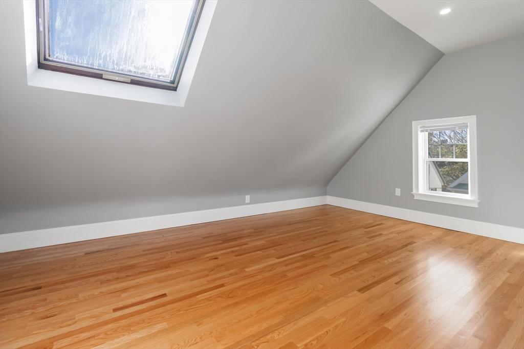 51 Mansfield Street, Unit 49 Everett, MA 02149 - Photo 25 of 31 a view of empty room with wooden floor and fan