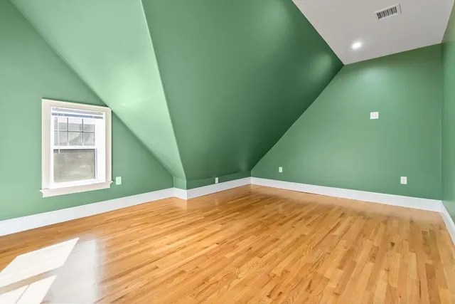 a view of a street with cars