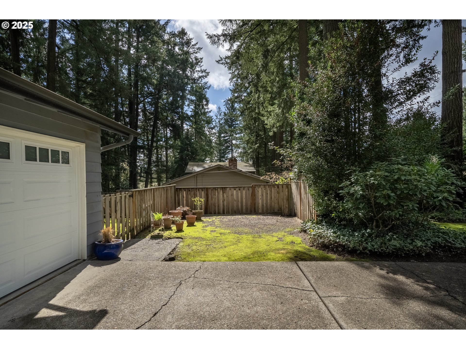 16808 Southwest Inverurie Road Lake Oswego, OR 97035 - Photo 3 of 38 a view of backyard with slide