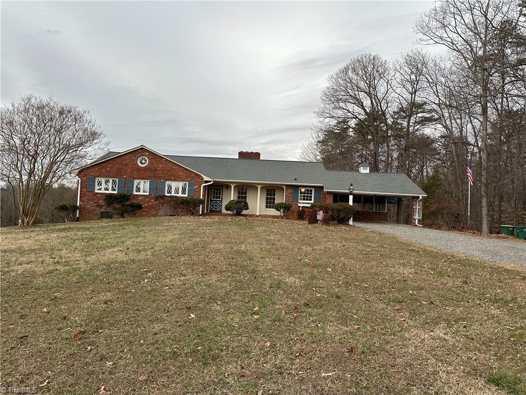 410 Doub Road Lewisville, NC 27023 - Photo 1 of 10 One level Ranch w/2 car carport