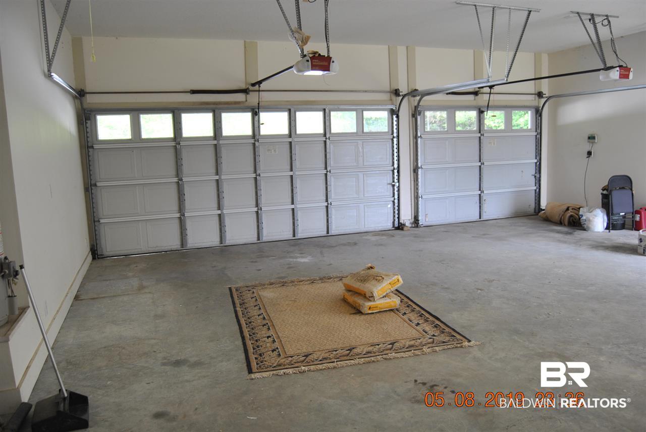 411 Juniper Creek Road Brewton, AL 36426 - Photo 29 of 35 3 car garage attached very nice entry from back