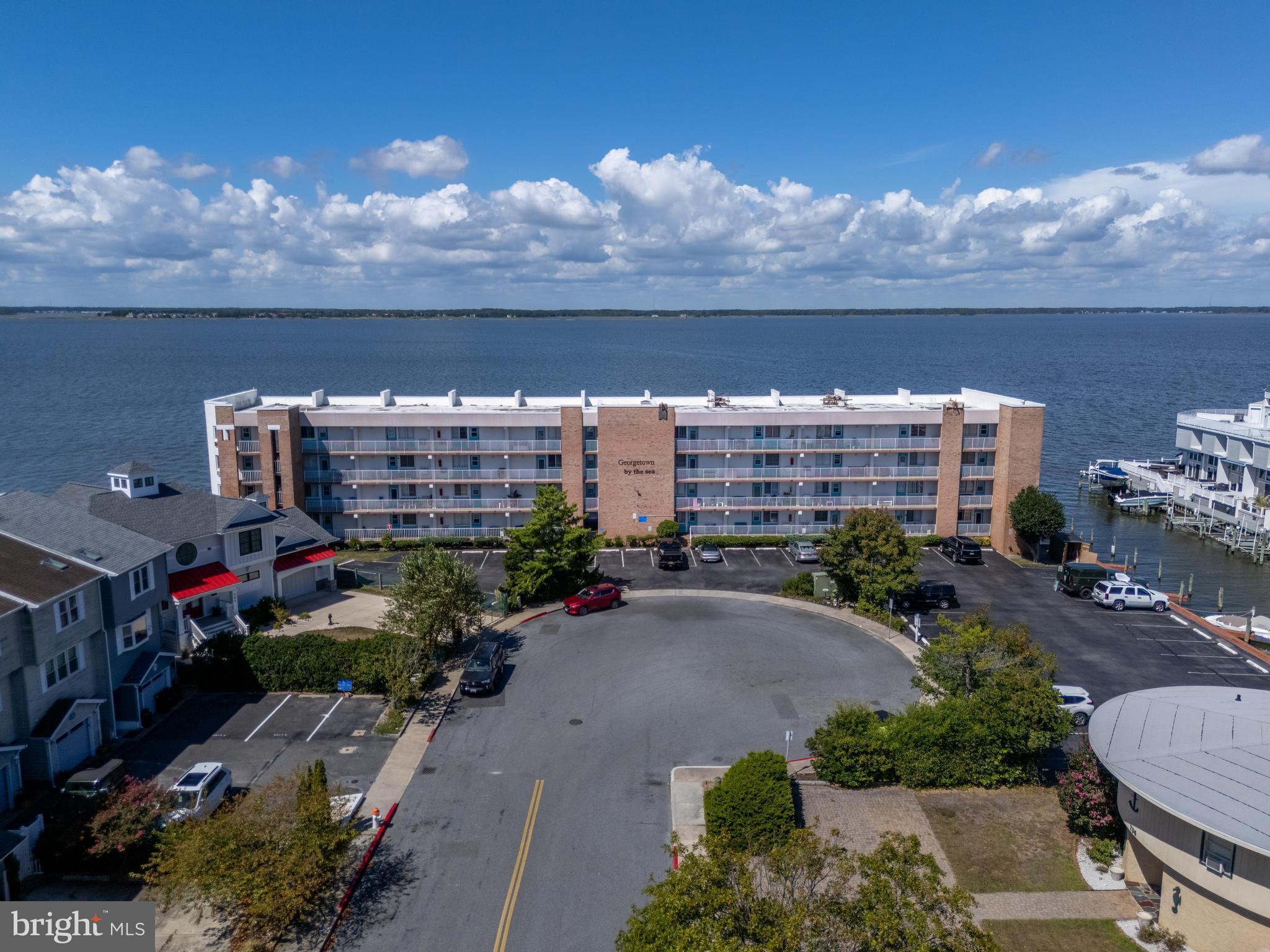 745 Mooring Road, Unit 202 Ocean City, MD 21842 - Photo 6 of 62 Drone picture of the building from the front