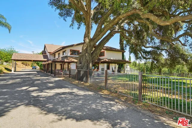 a view of a table and chairs in patio