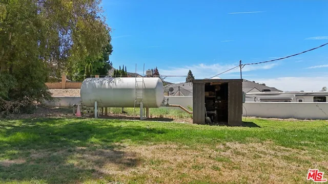 a view of a road with a building in the background