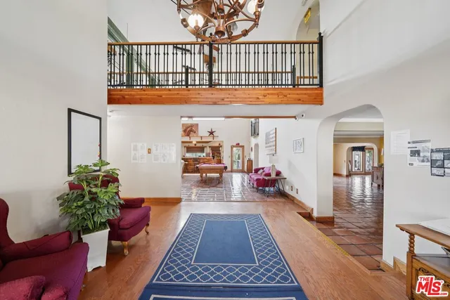 a bed room with a bed and a window