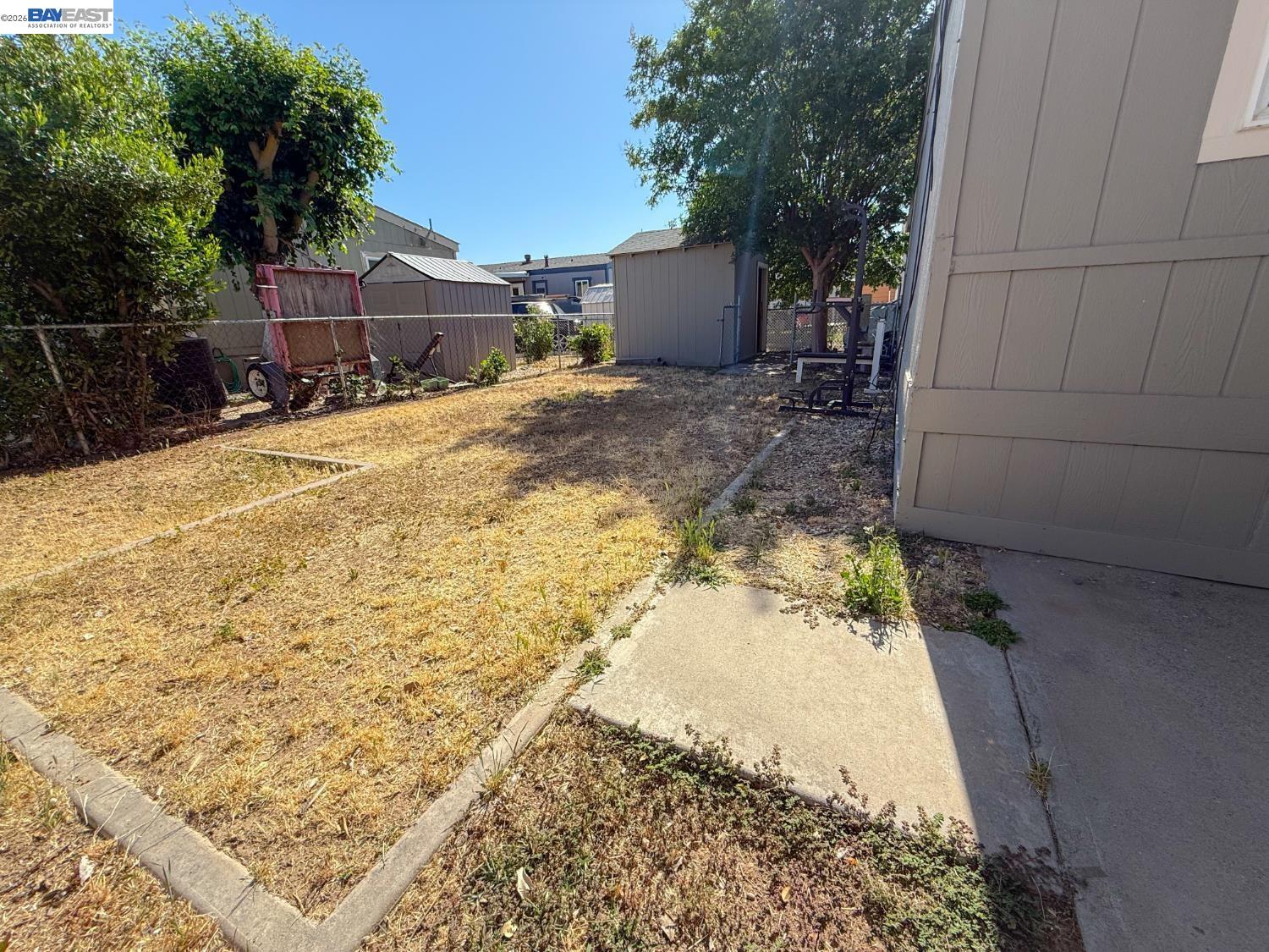 4404 Raiders Way, Unit 81 Modesto, CA 95355 - Photo 17 of 17 a view of a backyard with sitting area