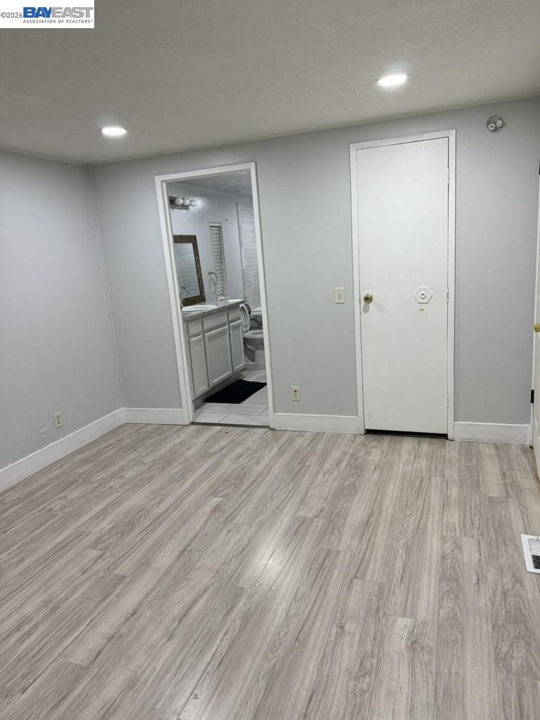 4404 Raiders Way, Unit 81 Modesto, CA 95355 - Photo 7 of 17 a view of a livingroom with wooden floor