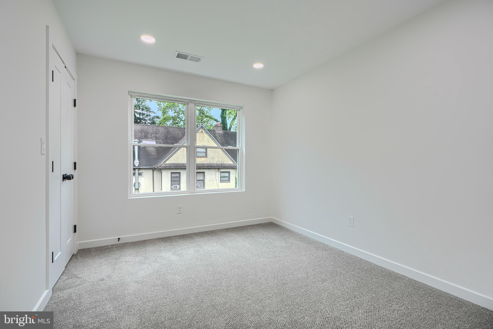3410 Pinkney Road Baltimore, MD 21215 - Photo 29 of 55 an empty room with a window