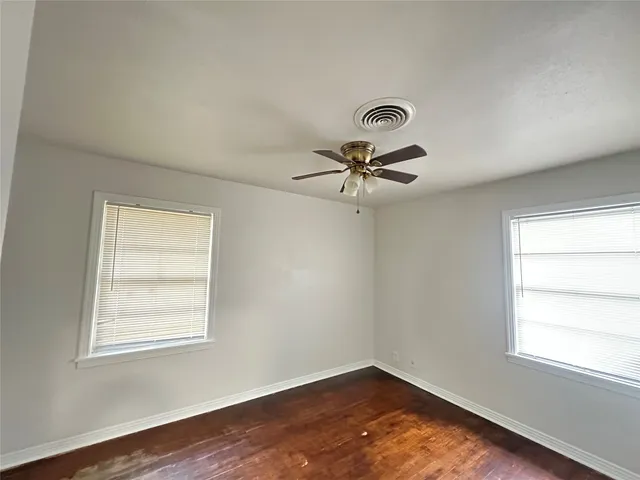 a view of a room that has a window in it