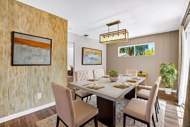 a view of a livingroom with wooden floor