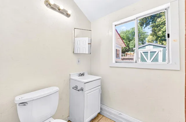an aerial view of a house with balcony