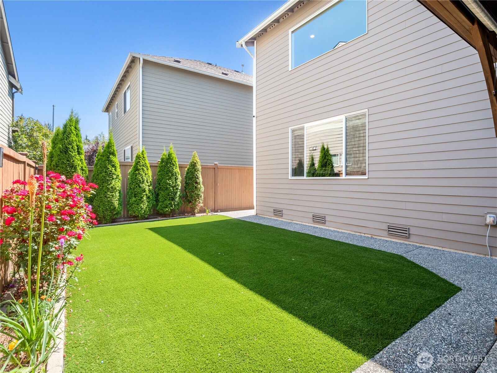 3923 186th Place Southeast Bothell, WA 98012 - Photo 35 of 40 a front view of a house with garden