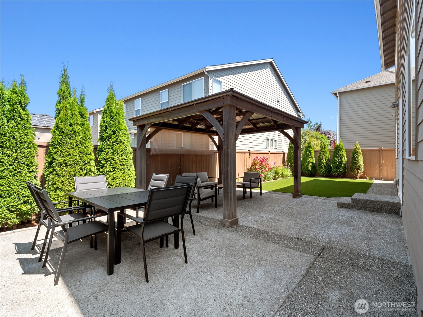3923 186th Place Southeast Bothell, WA 98012 - Photo 36 of 40 a view of a sitting area with furniture and a yard