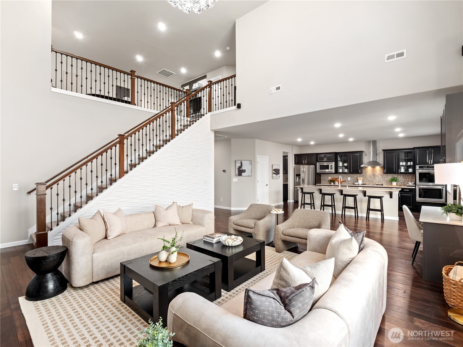 3923 186th Place Southeast Bothell, WA 98012 - Photo 6 of 40 a living room with furniture and kitchen view