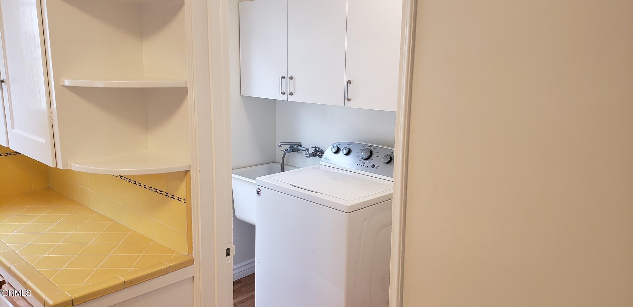 1130 Heather Square Pasadena, CA 91104 - Photo 8 of 12 a utility room with dryer and washer