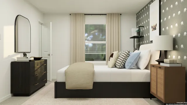 a living room with furniture and a window