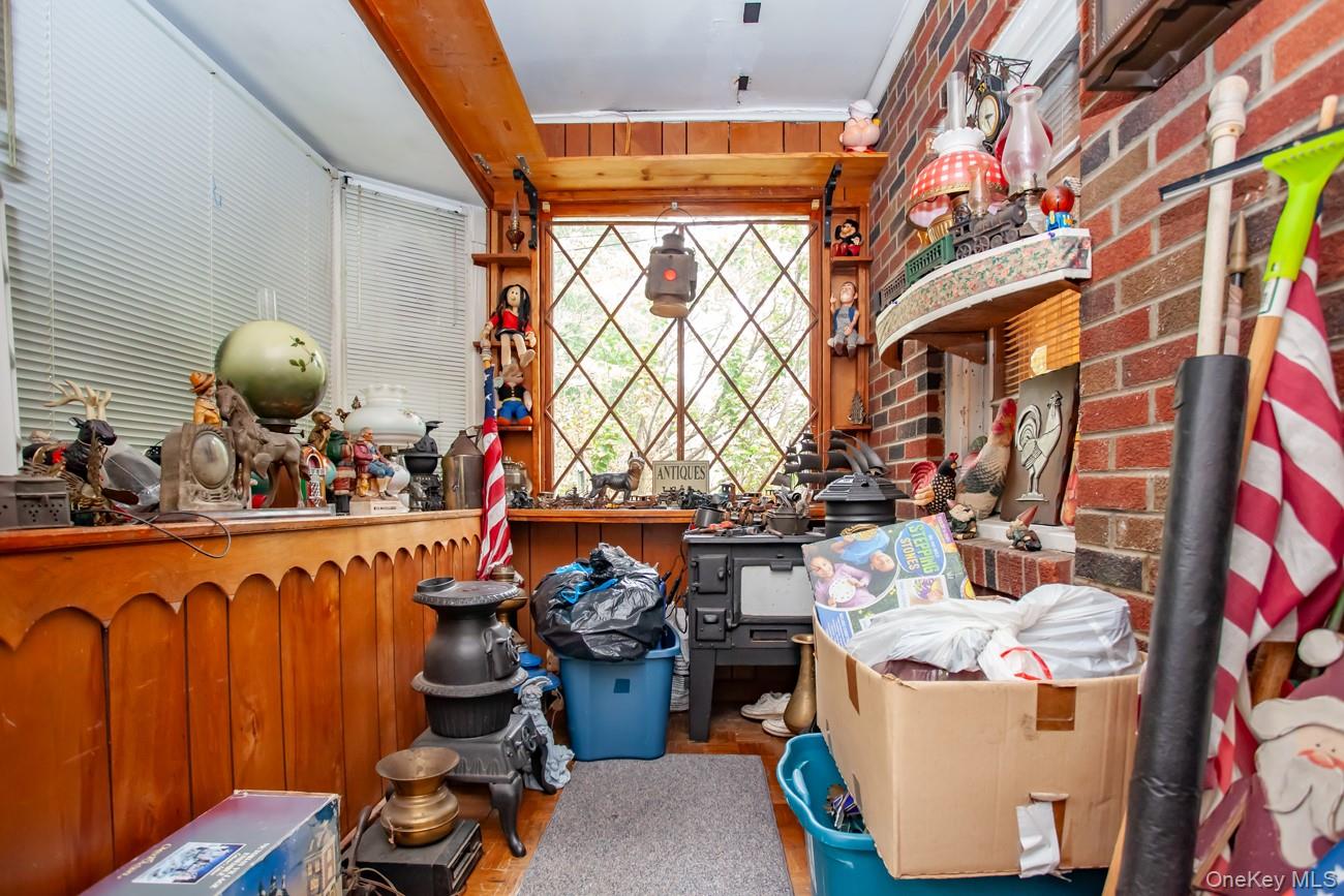 211 Broadway Verplanck, NY 10596 - Photo 23 of 48 a room with water heater and wooden floor