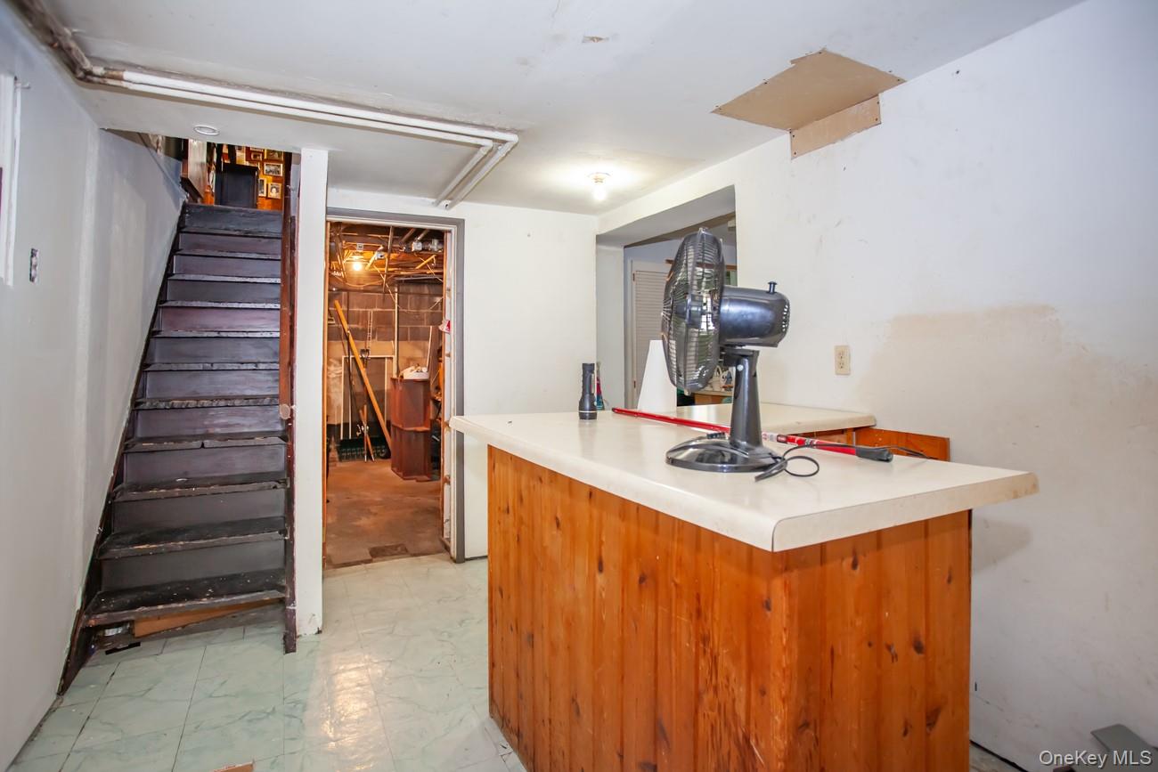 211 Broadway Verplanck, NY 10596 - Photo 24 of 48 a hallway view with wooden floor and electronic appliances