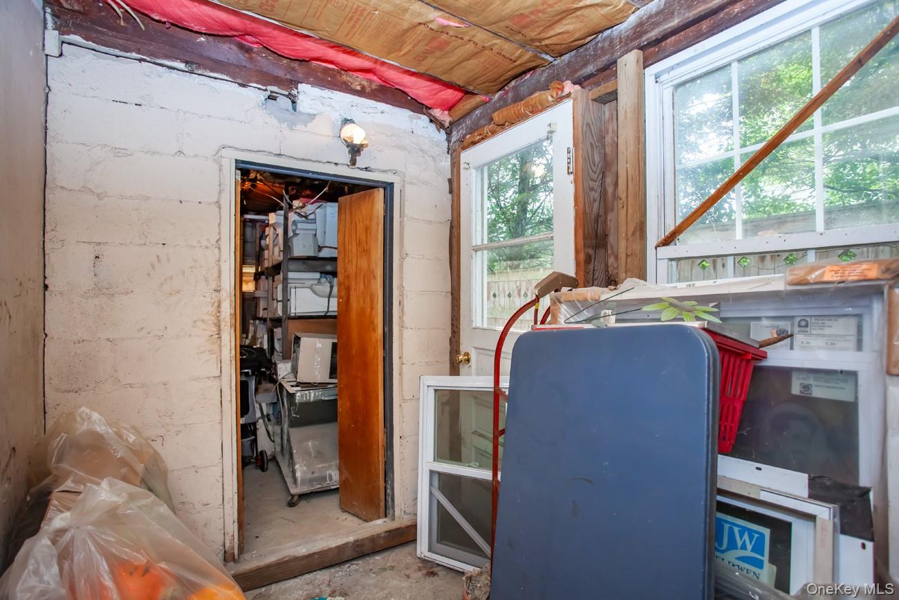 211 Broadway Verplanck, NY 10596 - Photo 38 of 48 a bed room with a bed and a window