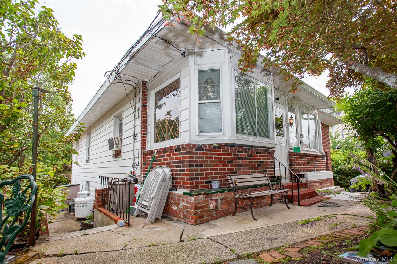 211 Broadway Verplanck, NY 10596 - Photo 40 of 48 a front view of a house with a garage