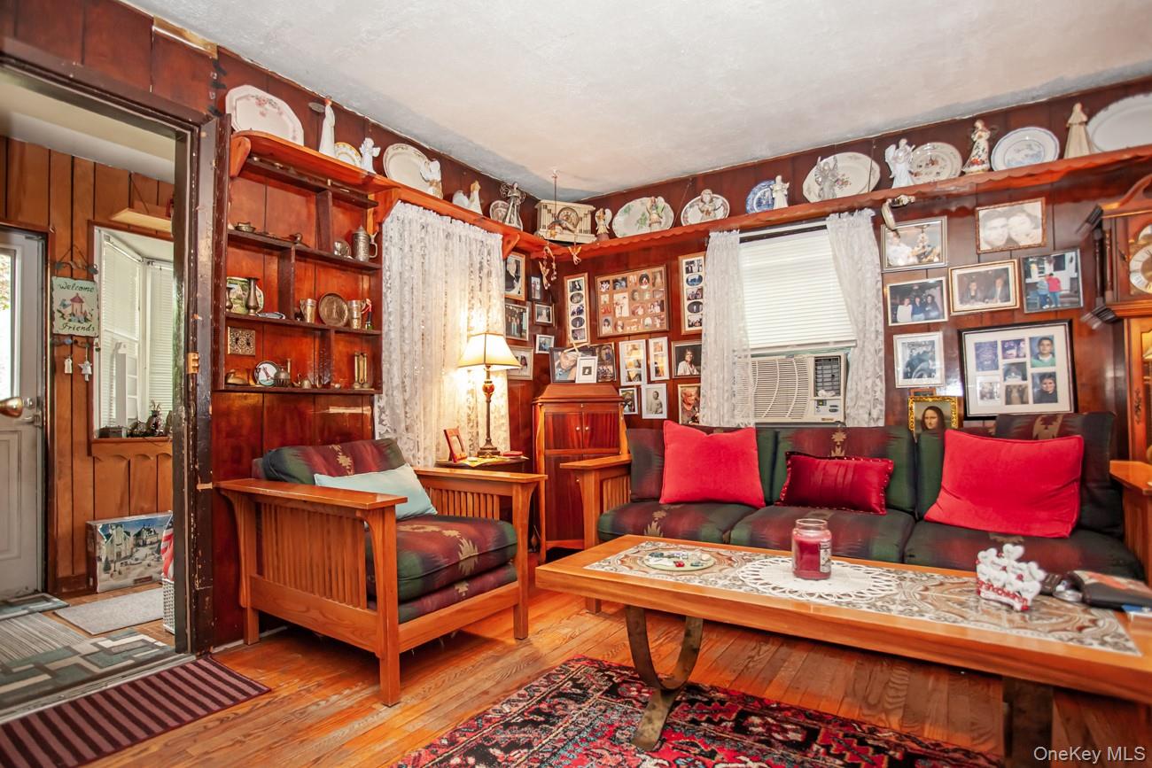 211 Broadway Verplanck, NY 10596 - Photo 6 of 48 a living room with furniture a rug and a window