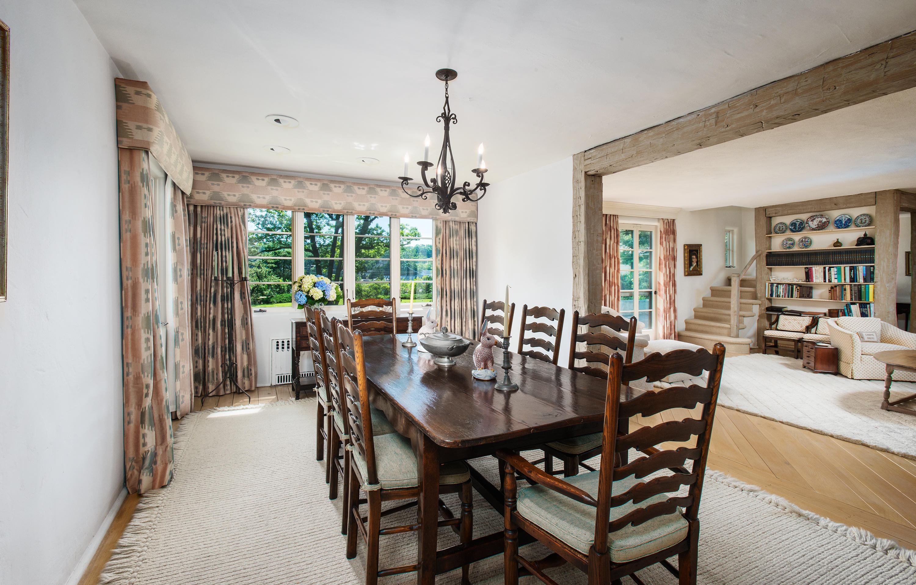 11 Contentment Island Road Darien, CT 06820 - Photo 13 of 31 a view of a dining room with furniture window and wooden floor