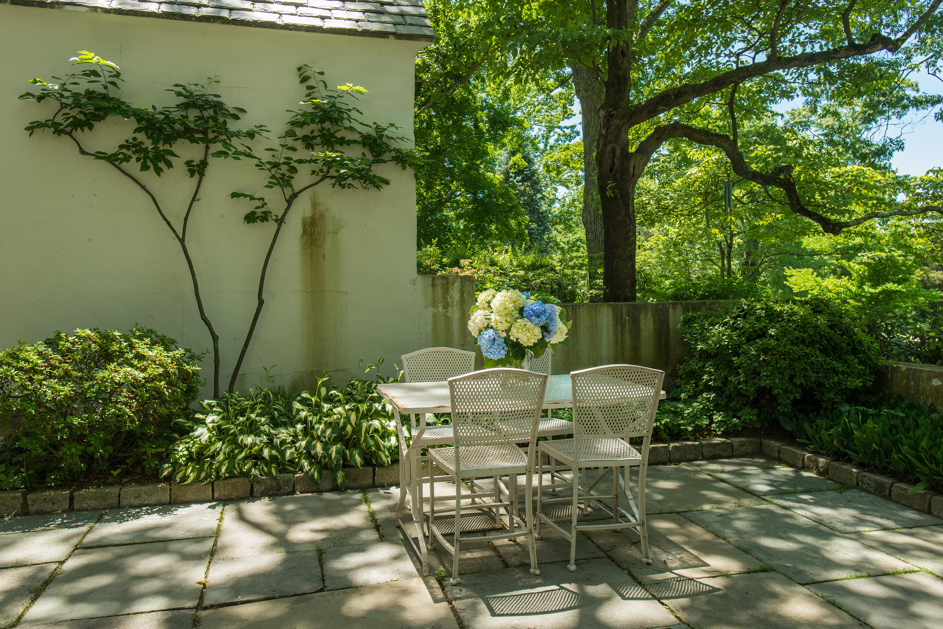 11 Contentment Island Road Darien, CT 06820 - Photo 24 of 31 a view of a chairs and table in the patio
