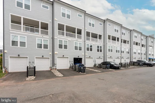 a front view of a building with street view