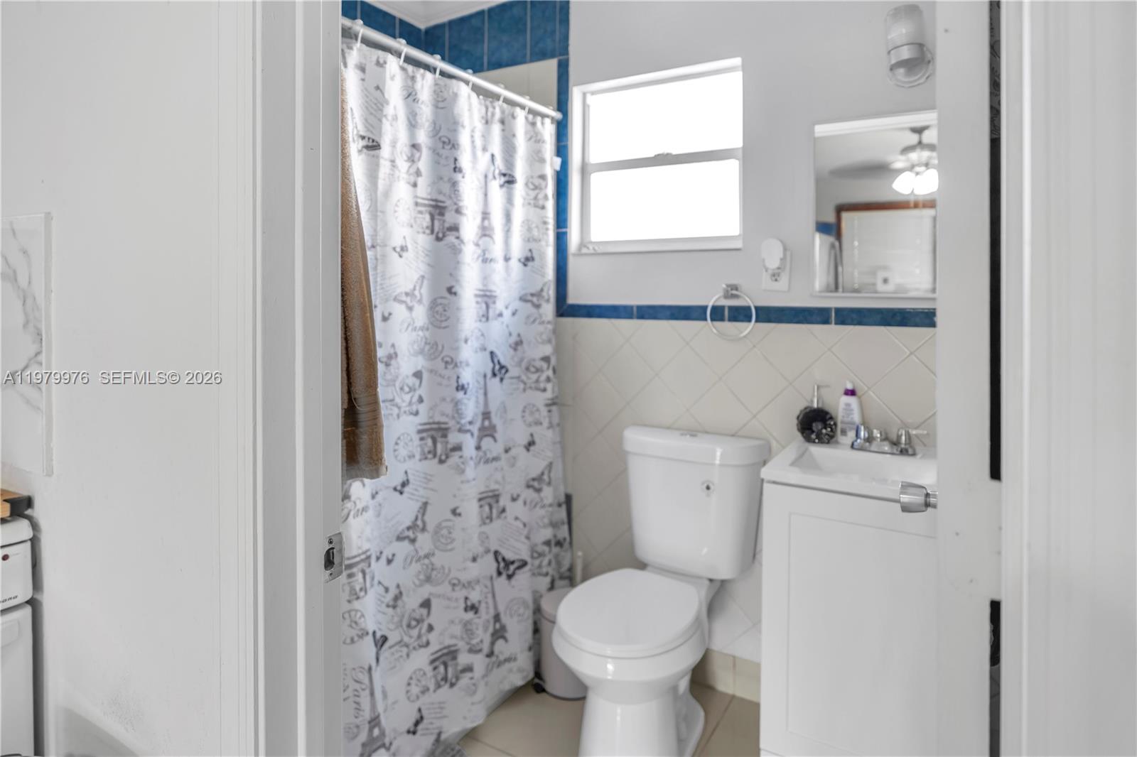 2900 Southwest 19th Street Miami, FL 33145 - Photo 18 of 24 a white toilet sitting next to a bathroom sink