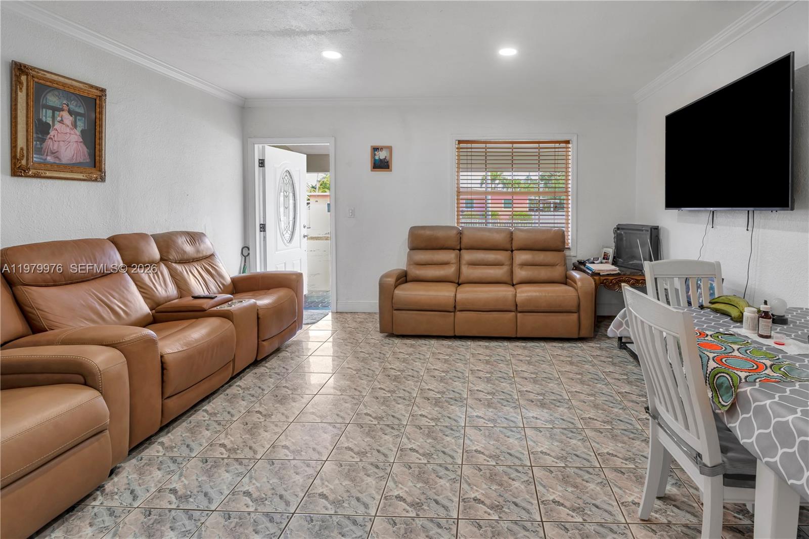2900 Southwest 19th Street Miami, FL 33145 - Photo 5 of 24 a living room with furniture and a flat screen tv