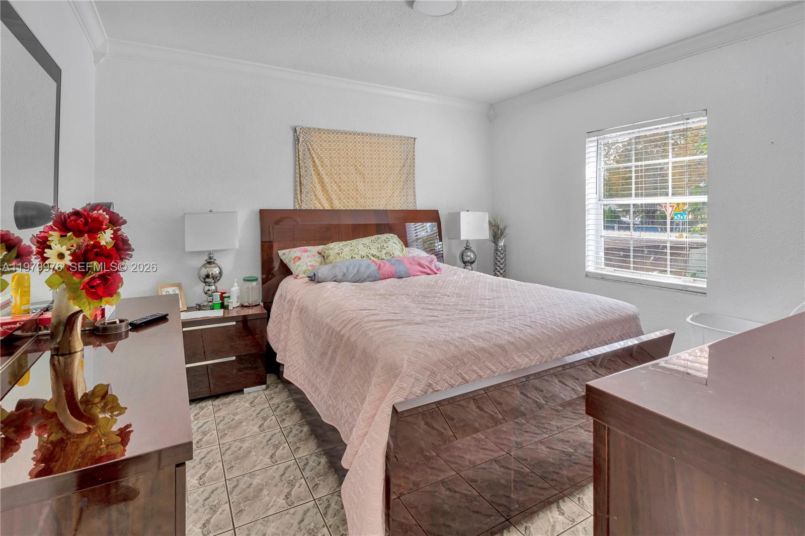 2900 Southwest 19th Street Miami, FL 33145 - Photo 6 of 24 a bedroom with a bed and a dresser