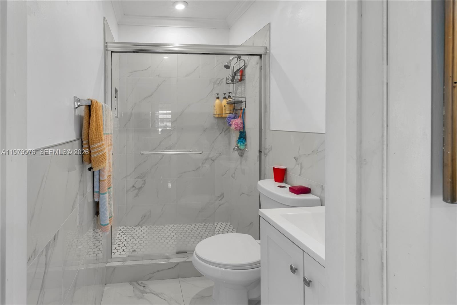 2900 Southwest 19th Street Miami, FL 33145 - Photo 7 of 24 a bathroom with a sink toilet and shower