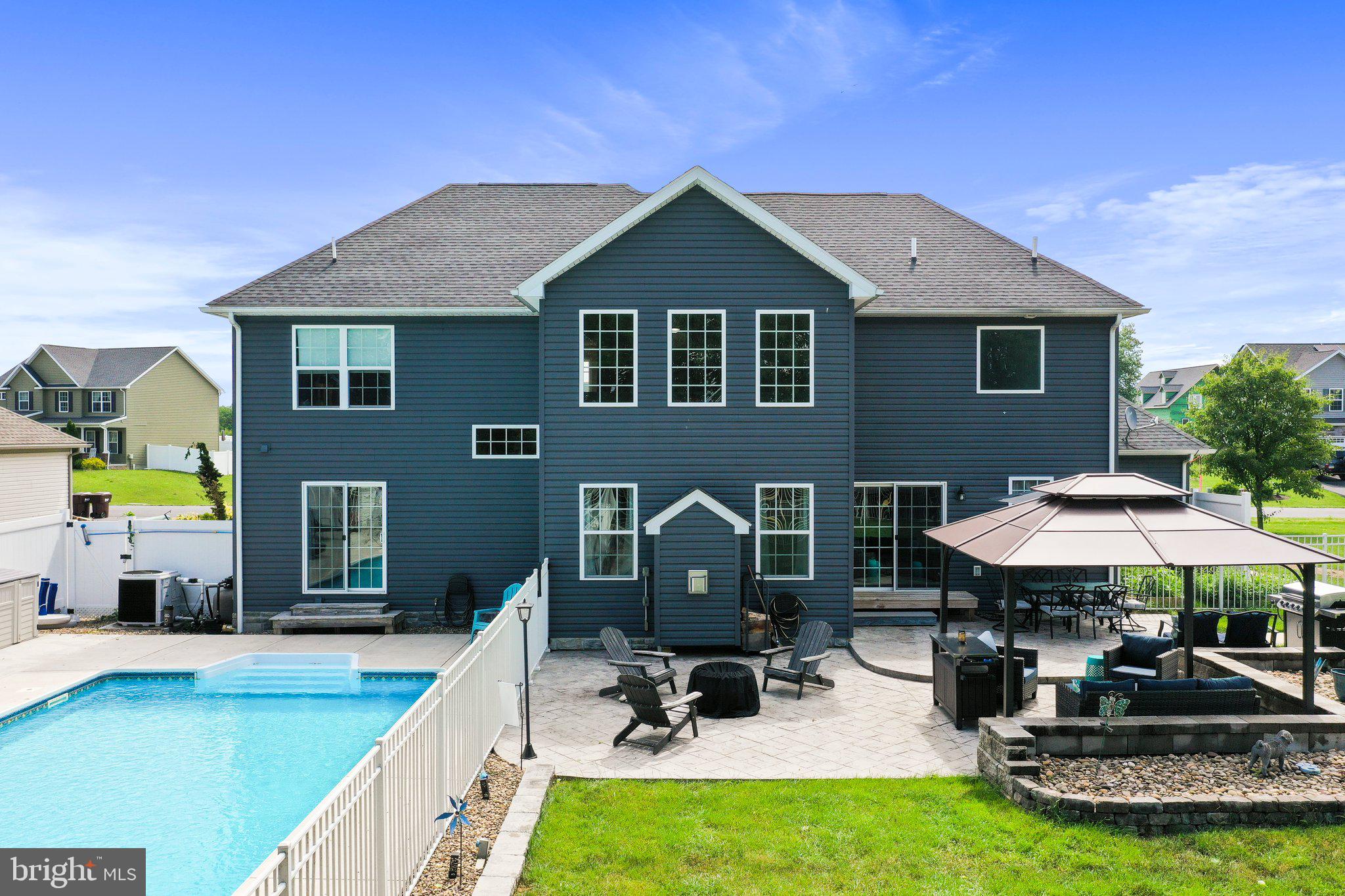 1673 Wind Flower Road, Unit 62 Chambersburg, PA 17202 - Photo 53 of 73 Stamped concrete patio outside pool area!