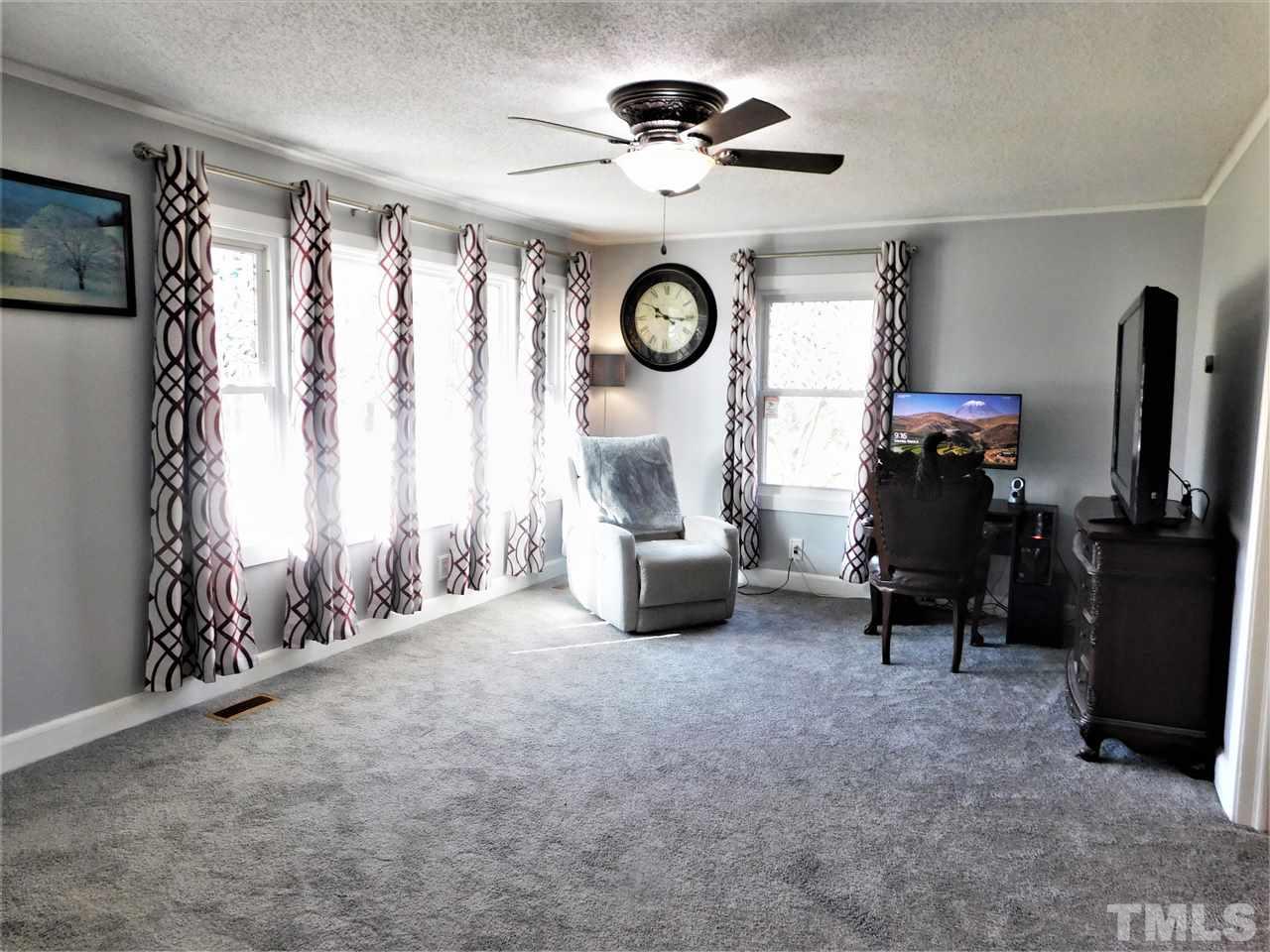 3033 Ross Road Durham, NC 27703 - Photo 15 of 30 a living room with furniture and a window