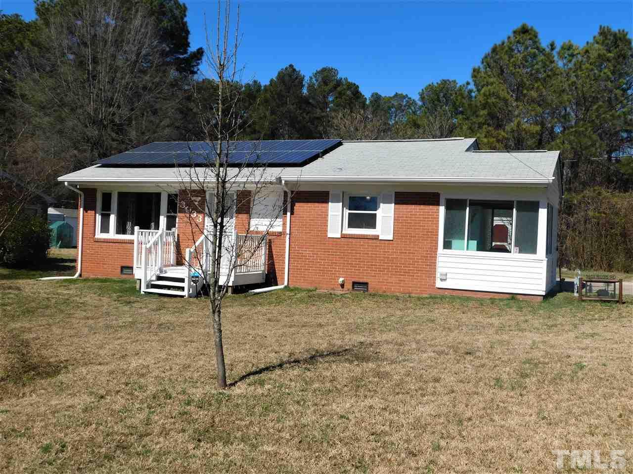 3033 Ross Road Durham, NC 27703 - Photo 24 of 30 a view of a house with backyard