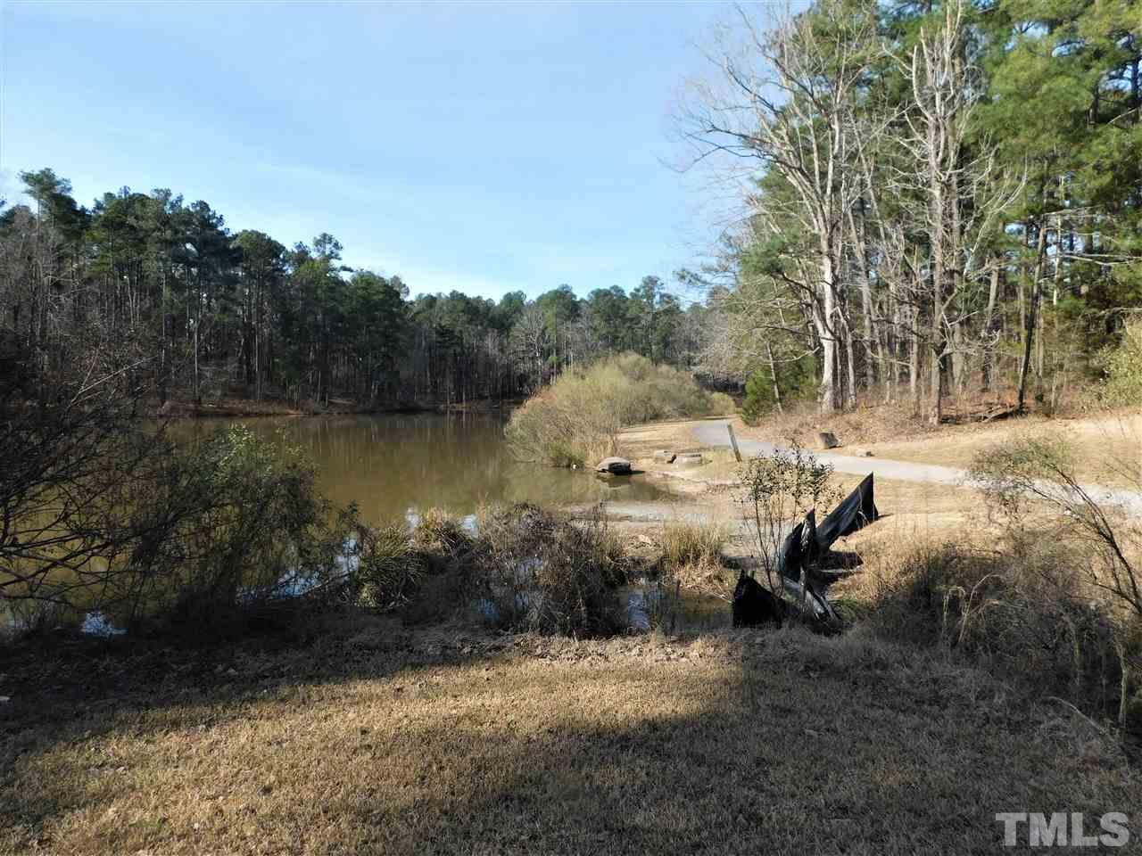 3033 Ross Road Durham, NC 27703 - Photo 30 of 30 a view of a lake with houses