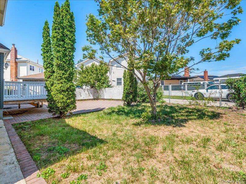 176-27 Sunbury Road Queens, NY 11434 - Photo 7 of 31 View of yard featuring a wooden deck