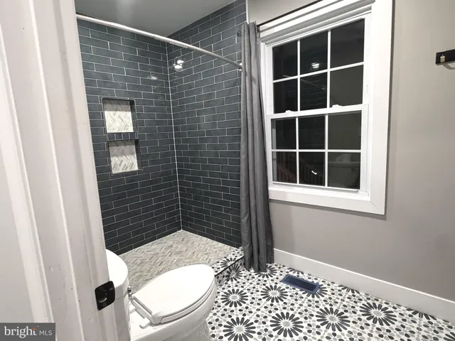 a bathroom with a toilet