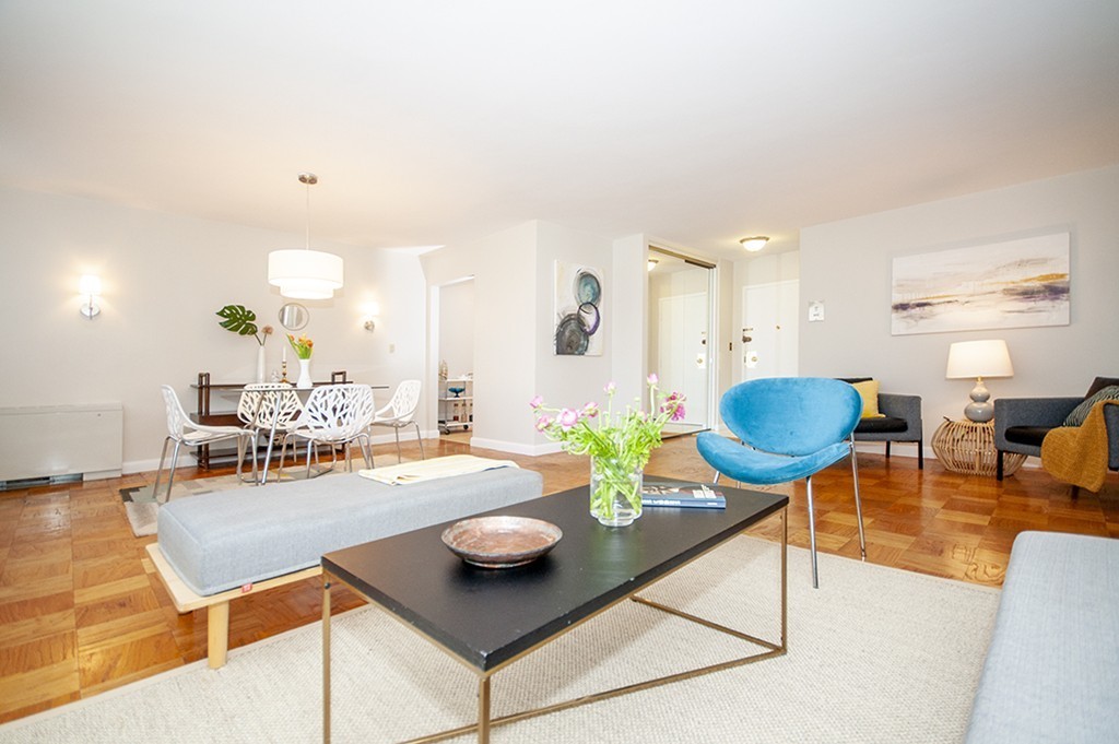 a view of a dining room with furniture and a table