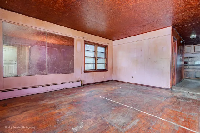 an empty room with windows