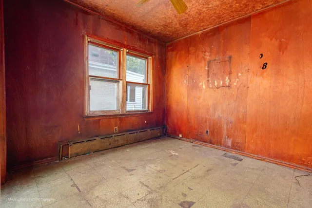 an empty room with windows