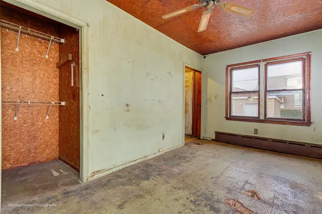 an empty room with windows