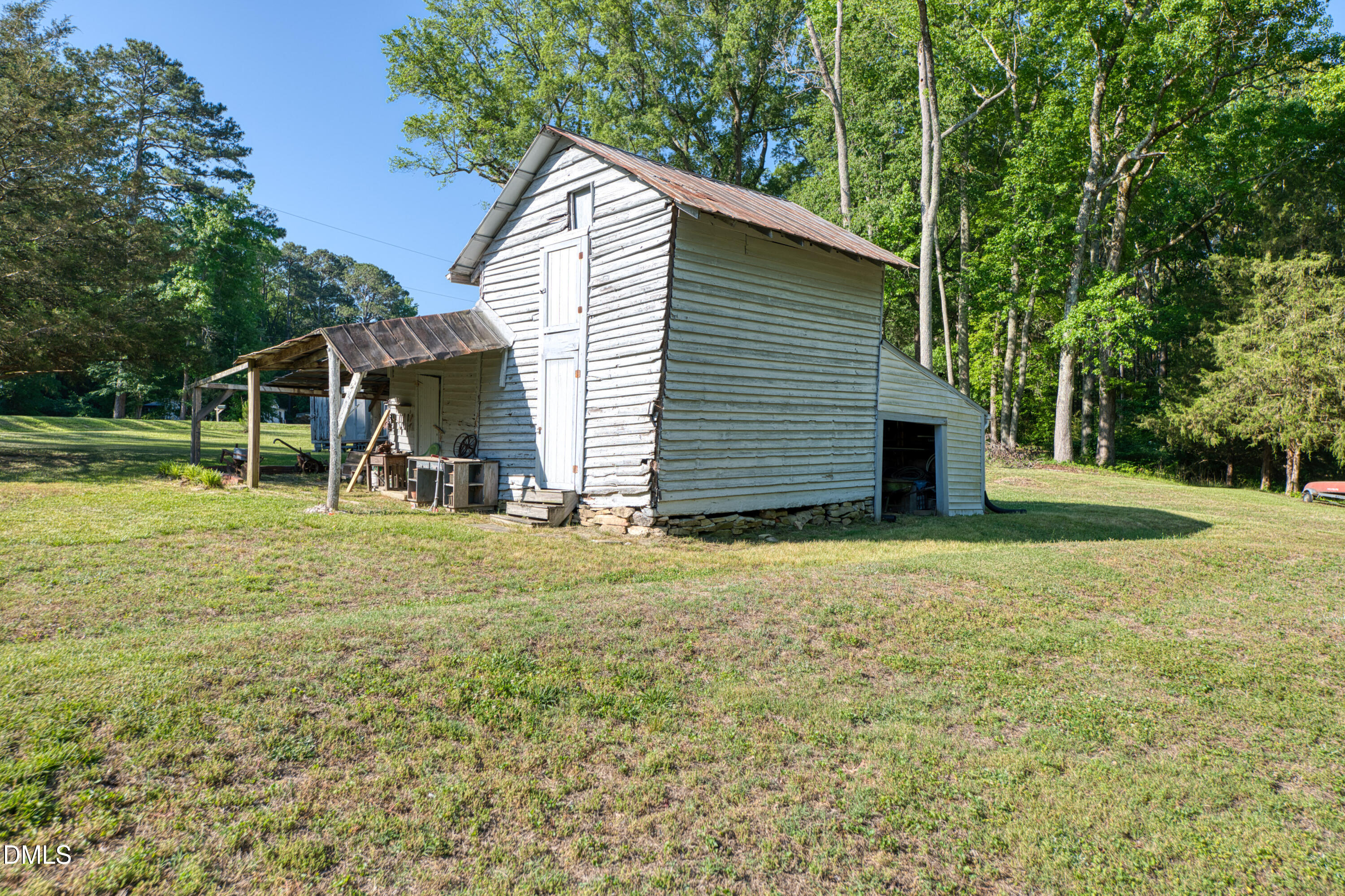 50 Robert Sledge Road Spring Hope, NC 27882 - Photo 33 of 50 a view of a house with backyard and trees