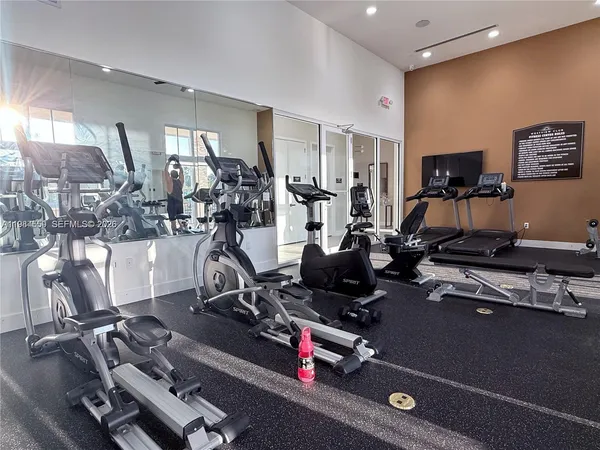 a view of a room with gym equipment
