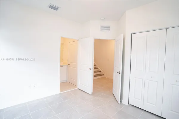 a view of a room with an empty space