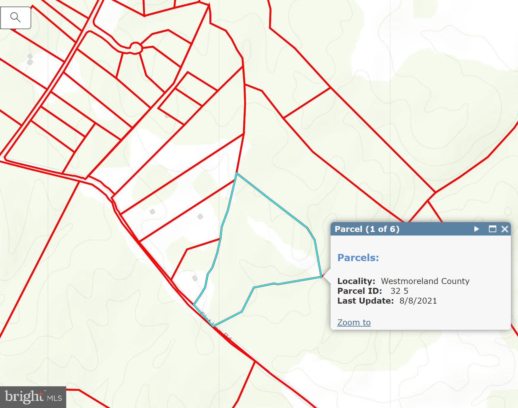 Flat Iron Road Montross, VA 22520 - Photo 3 of 5 a sign on a wall next to a road