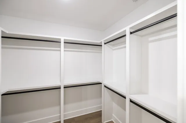 a view of an empty walk in closet